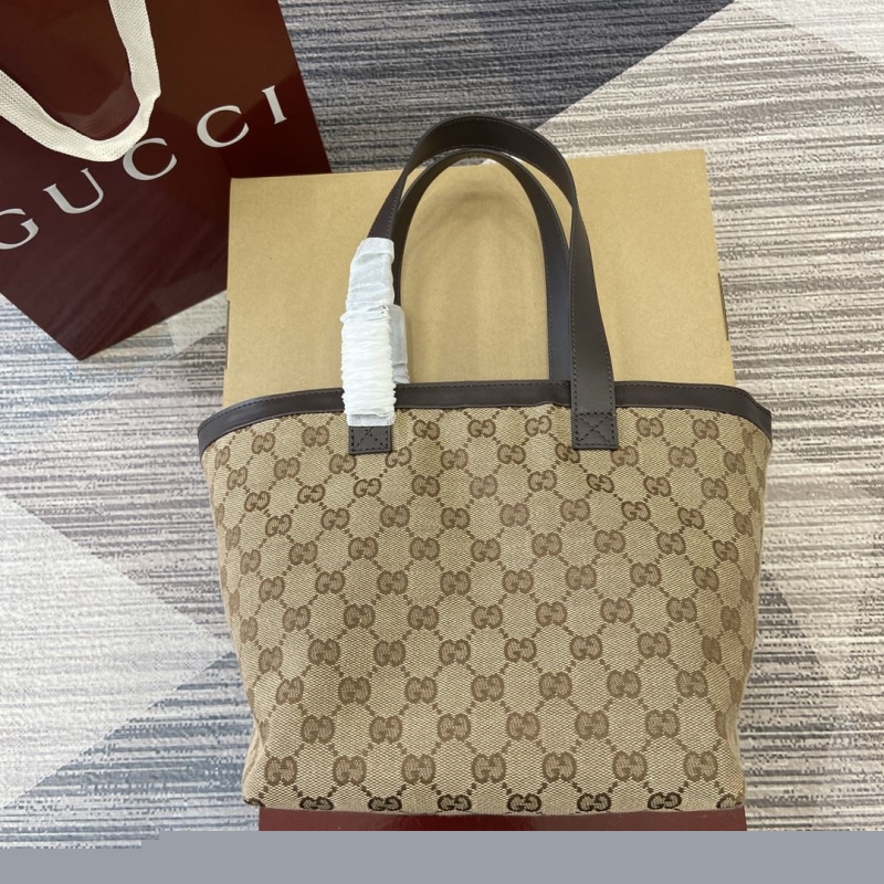 G*u*i shopping bags